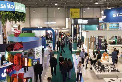 Industry professionals meeting on an exhibition floor